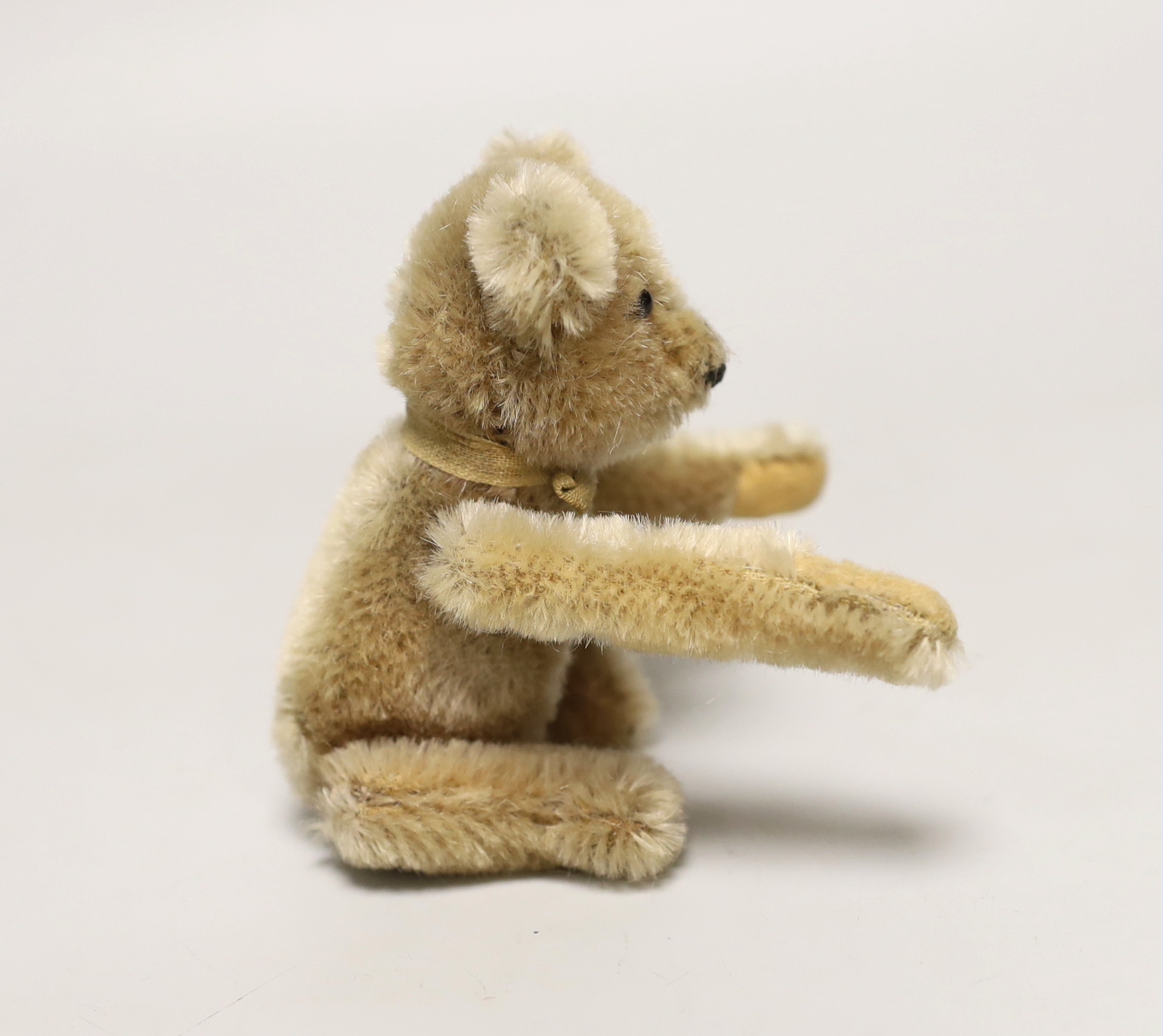 A Schuco tumbling bear with key, c.1950. 5in., excellent condition